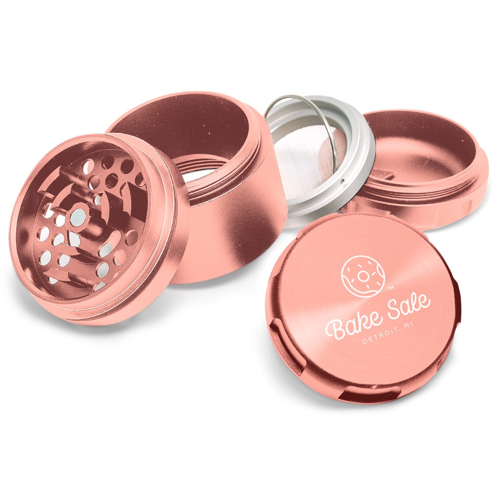 Bake Sale 5-Part Donut Pattern Aircraft Grade Aluminum Grinder | Rose Gold logo
