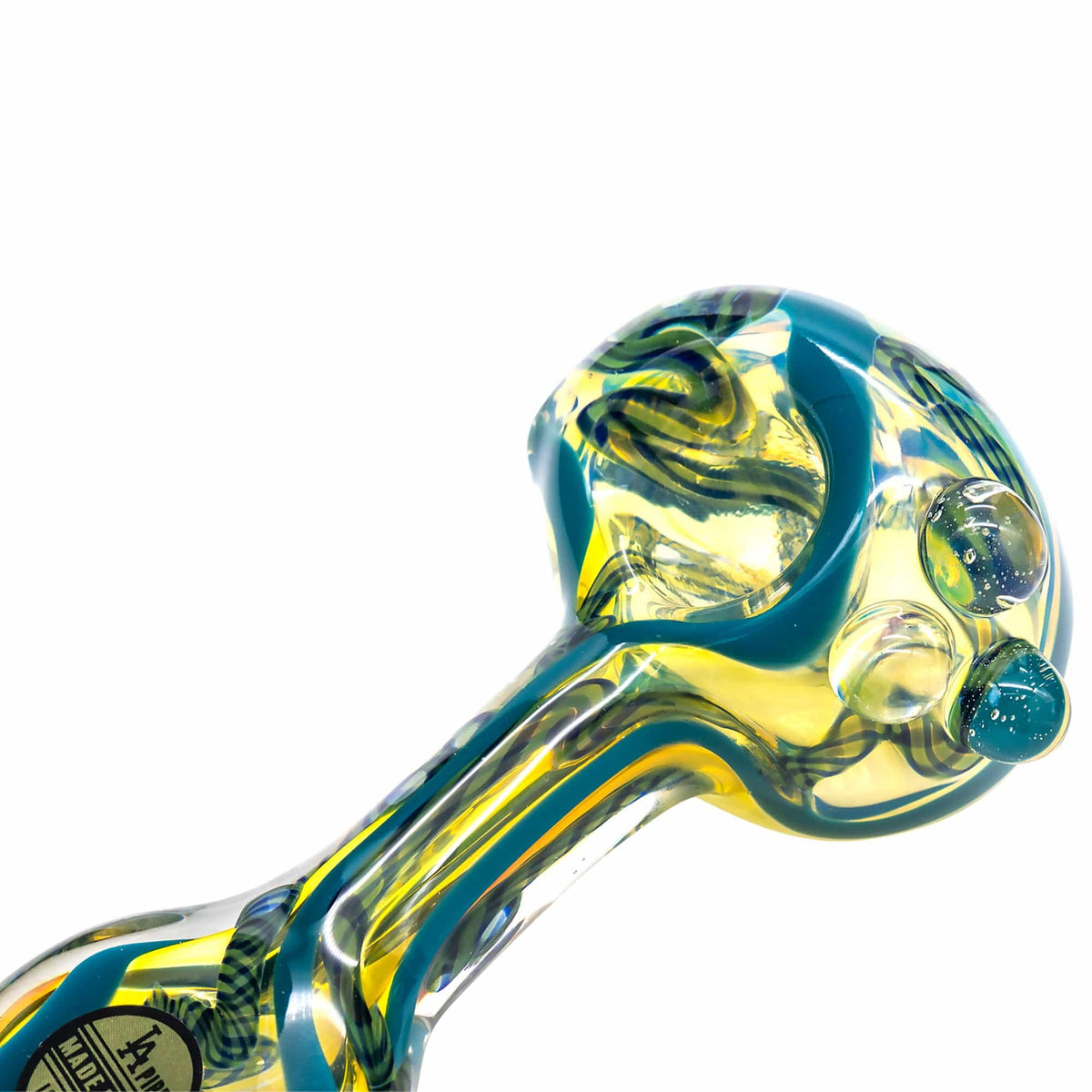 Close-up view of the Candy Spoon Inside-Out Color Changing Glass Pipe, showcasing its swirling, colorful glass design.