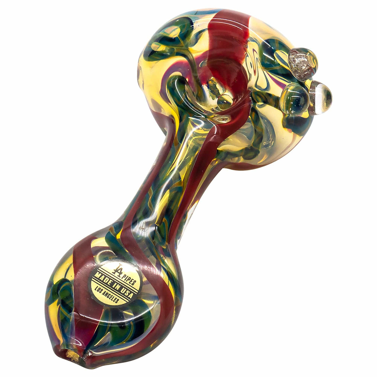 A side view of the Candy Spoon Inside-Out Color Changing Glass Pipe, showcasing its vibrant, swirling color pattern.