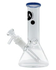 A studio shot of the Color Accented Mini Beaker Bong, showcasing its clear glass construction and blue accent ring.
