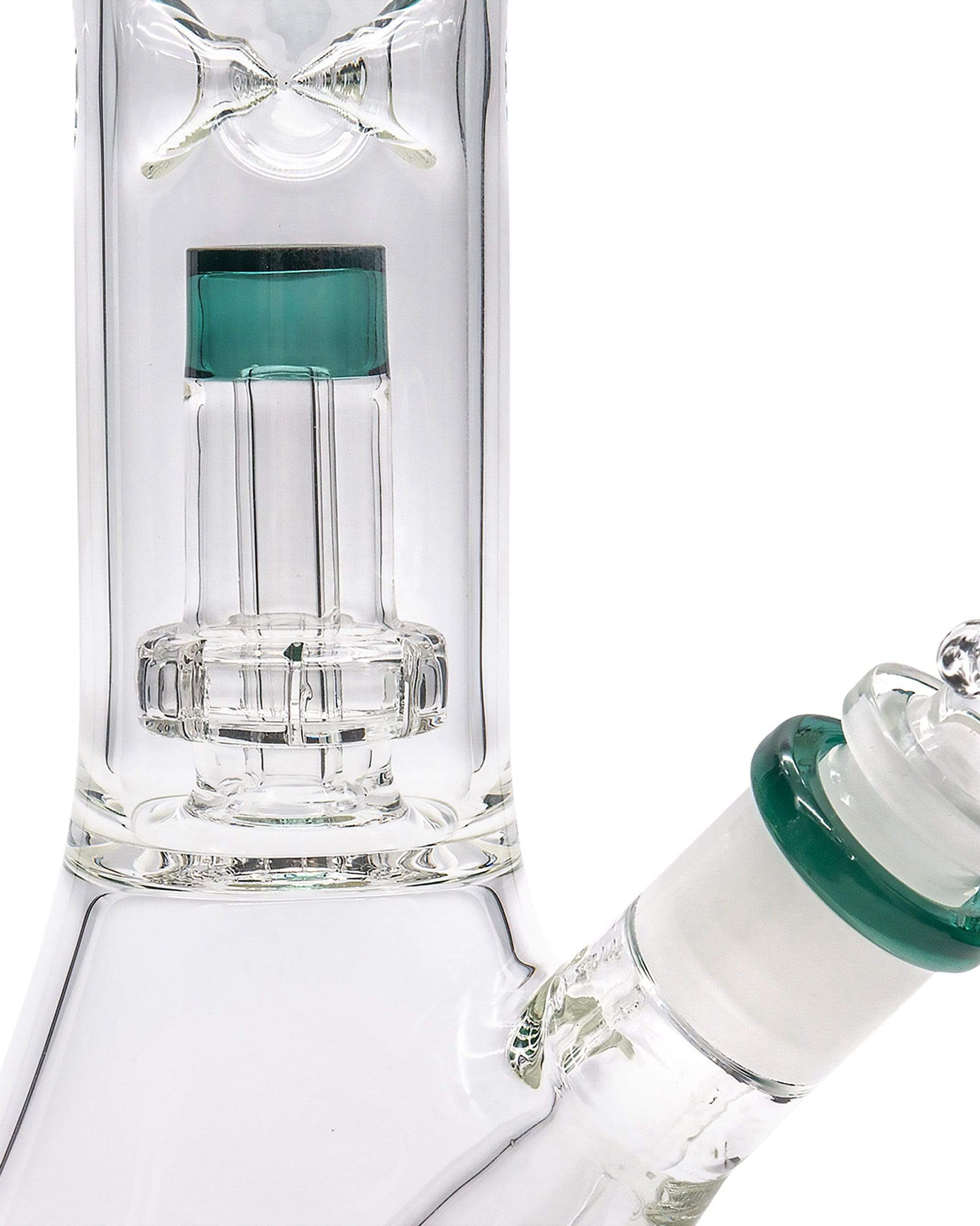 A close-up, angled view of the Color Accented Showerhead Perc Beaker Bong, highlighting the clear glass and green accent details.