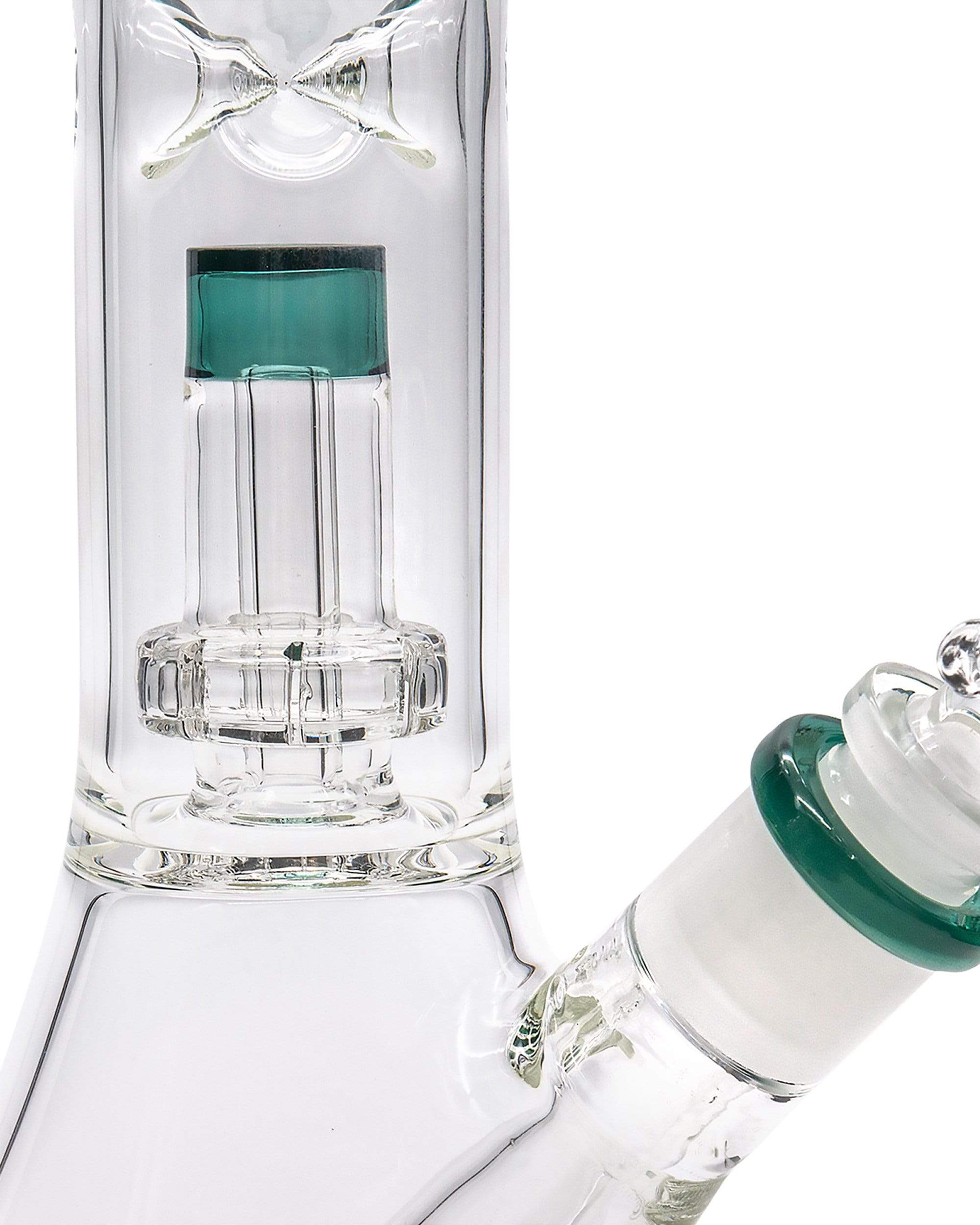 A close-up, angled view of the Color Accented Showerhead Perc Beaker Bong, highlighting the clear glass and green accent details.