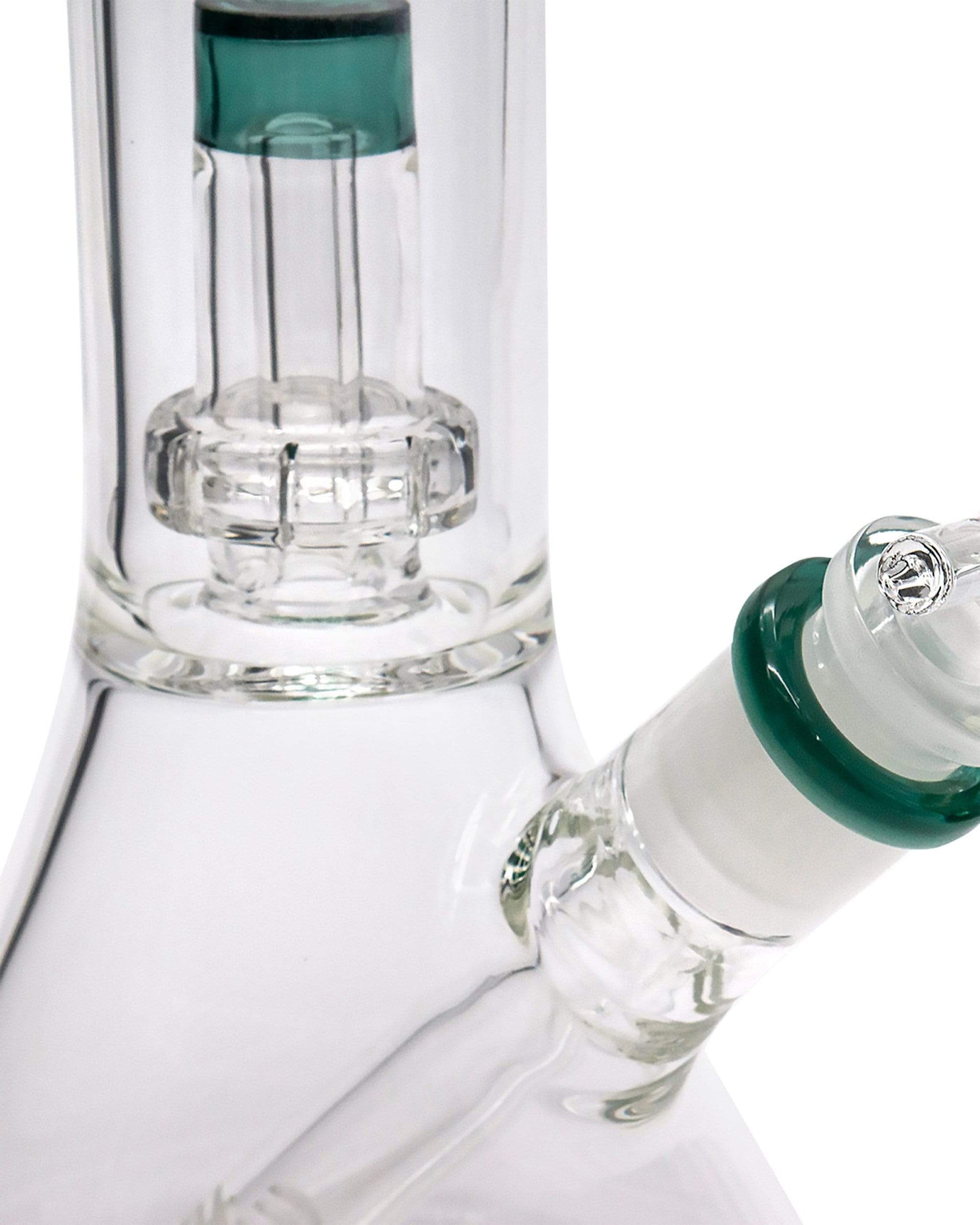 Close-up, angled view of the Color Accented Showerhead Perc Beaker Bong, highlighting the clear glass and showerhead perc diffuser.