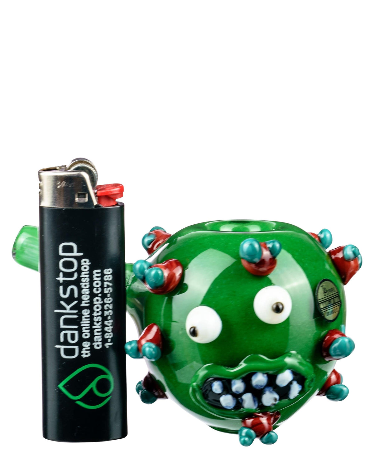 A side view of “The COVID Kid” hand pipe shows a colorful, textured design next to a lighter.