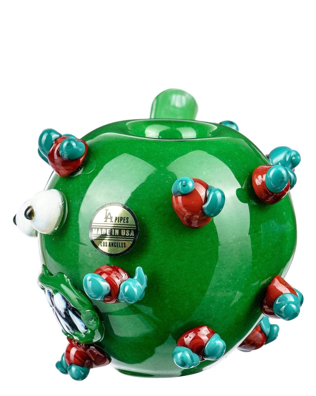 Front view of “The COVID Kid” hand pipe, a green glass piece with red and blue bubble-like embellishments.