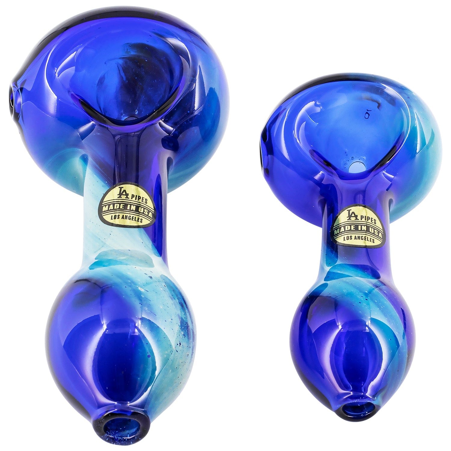 Top-down close-up of two glossy blue LA Pipes Fumed Galaxy Spoon Pipe pieces showing their rounded bowls, swirling aqua accents and gold "Made in USA" labels.