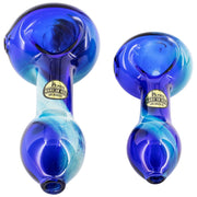 Top-down close-up of two glossy blue LA Pipes Fumed Galaxy Spoon Pipe pieces showing their rounded bowls, swirling aqua accents and gold "Made in USA" labels.