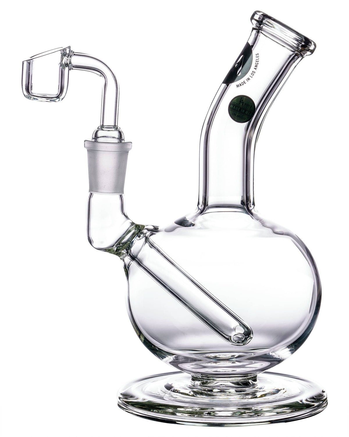 A three-quarter view of the Heavy Mini Pedestal Dab Rig, showcasing its clear glass construction and compact size.