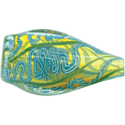 A close-up of the "Skipping Stone" Inside-Out Chillum with swirling green and yellow glass visible in a side view.