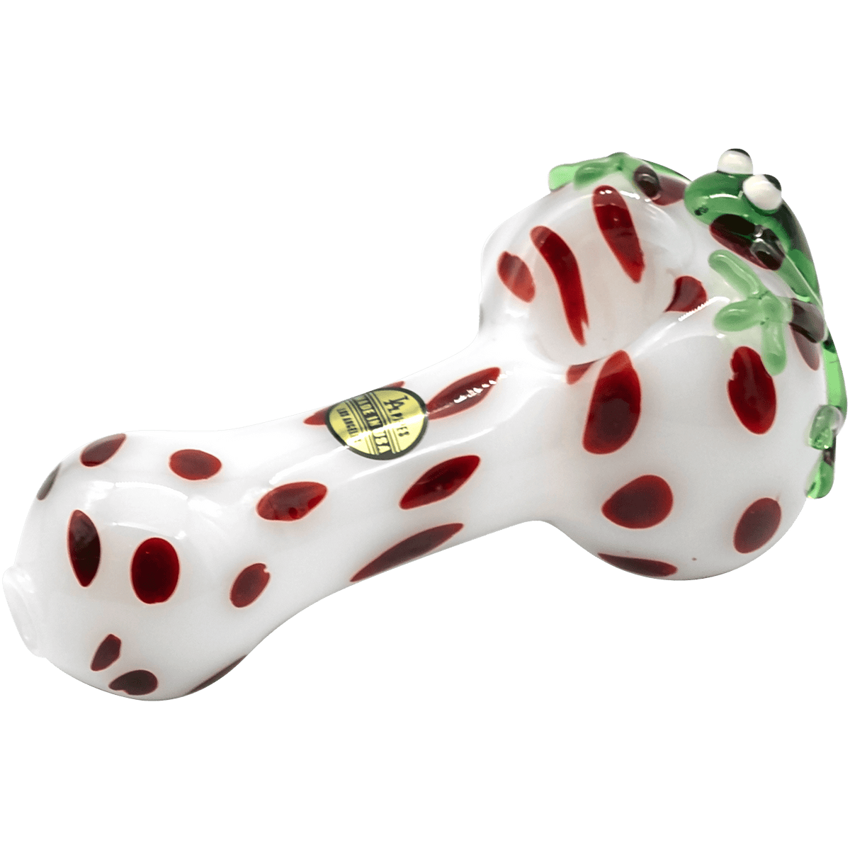A side view of the "Spotted Poison Frog" spoon glass pipe, displaying its colorful, speckled design against a plain white background.