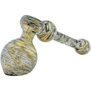 A three-quarter view of “The Full Rake” Fumed Hammer Bubbler Pipe, showcasing its textured glass and rounded form against a plain white background.