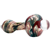 A side view of "The Primordial Ooze" Glass Spoon Pipe, featuring swirling green and red hues in a smooth glass design.