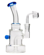 A side view of the Layer Cake Color Accented Dab Rig shows a clear glass rig with a colorful accent and a compact, layered design.