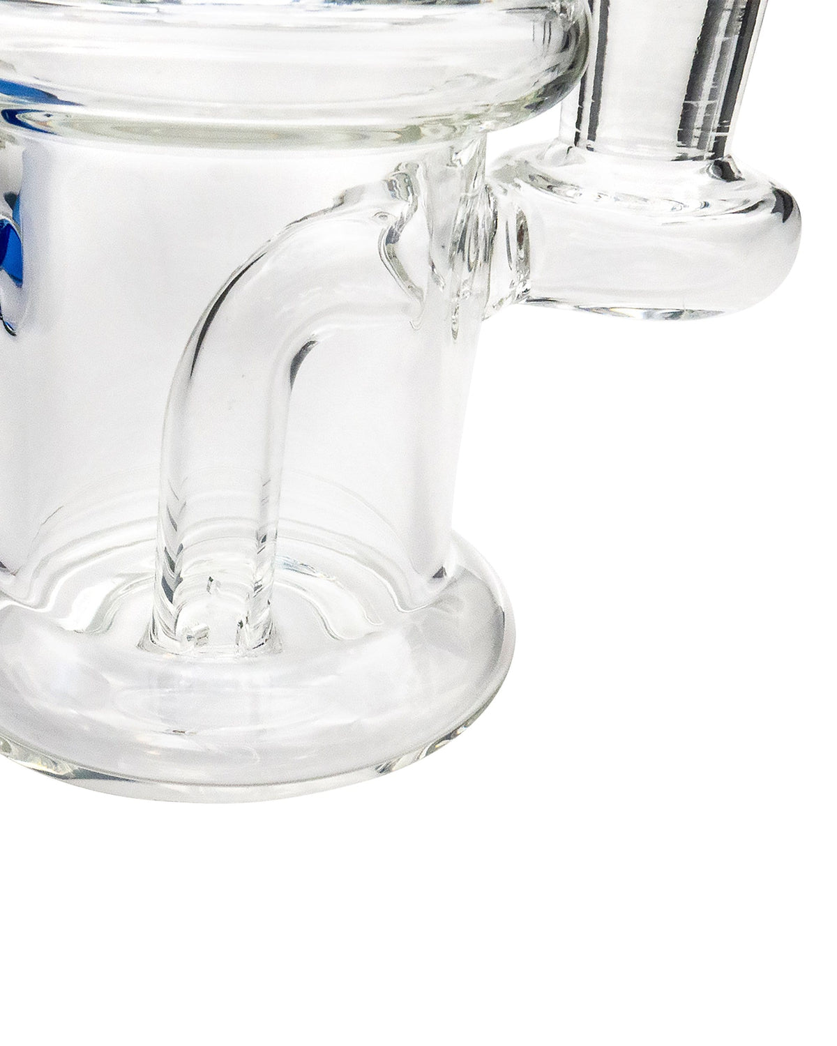 A close-up, angled view of the Mini Barrel Dab Rig, showcasing its clear glass construction and compact barrel shape.