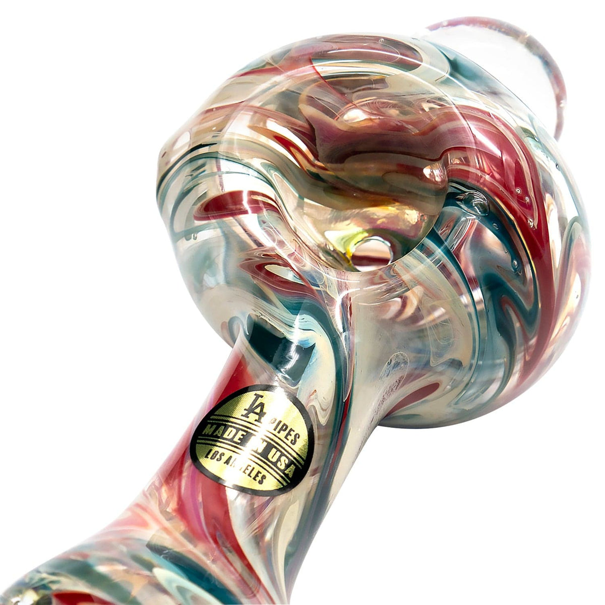 A close-up, angled view of “The Primordial Ooze” Glass Spoon Pipe, showcasing its colorful, swirled glass design.