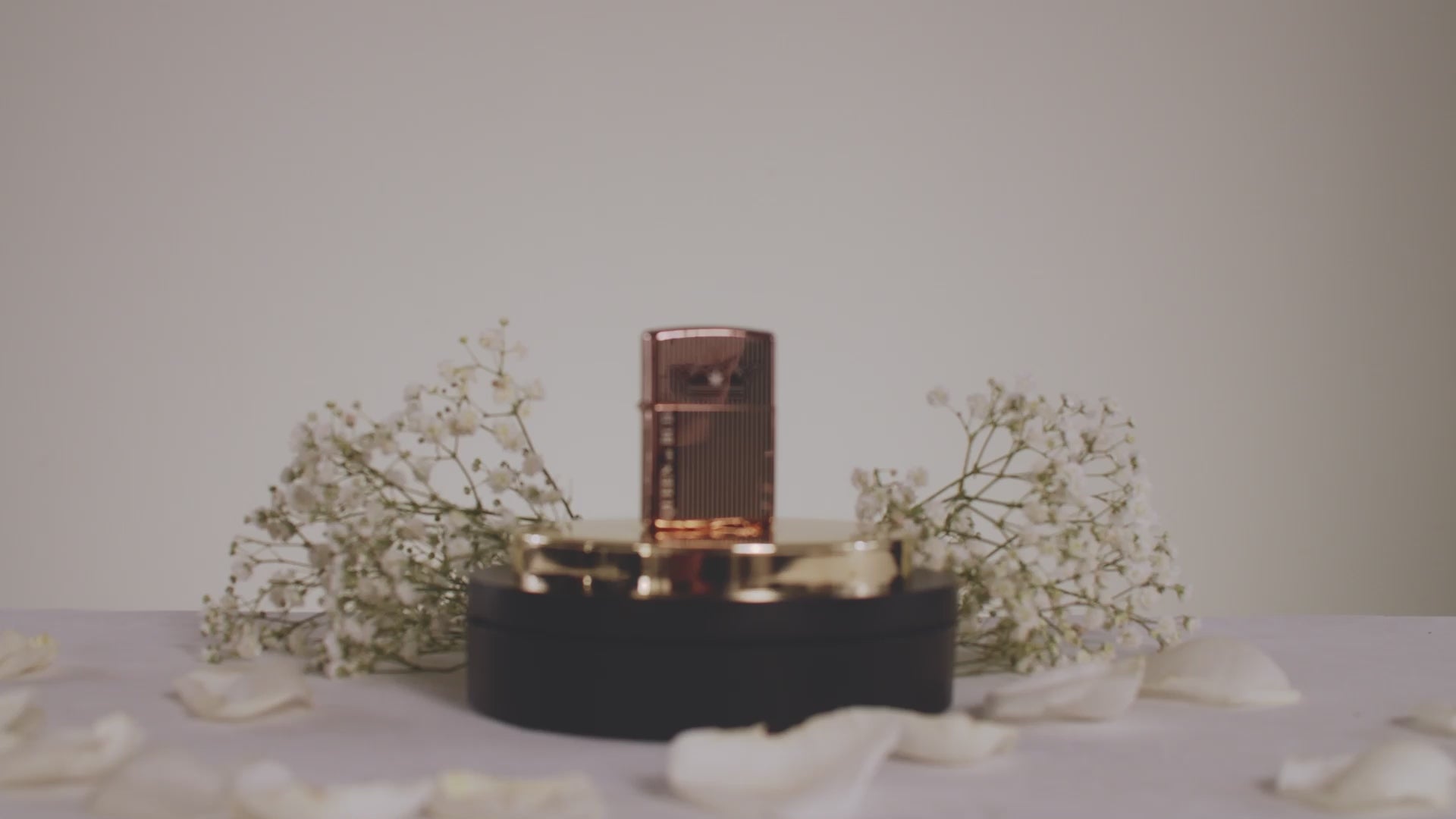 Load video: Queen of Bud Rose Quartz Vertical Flame Zippo