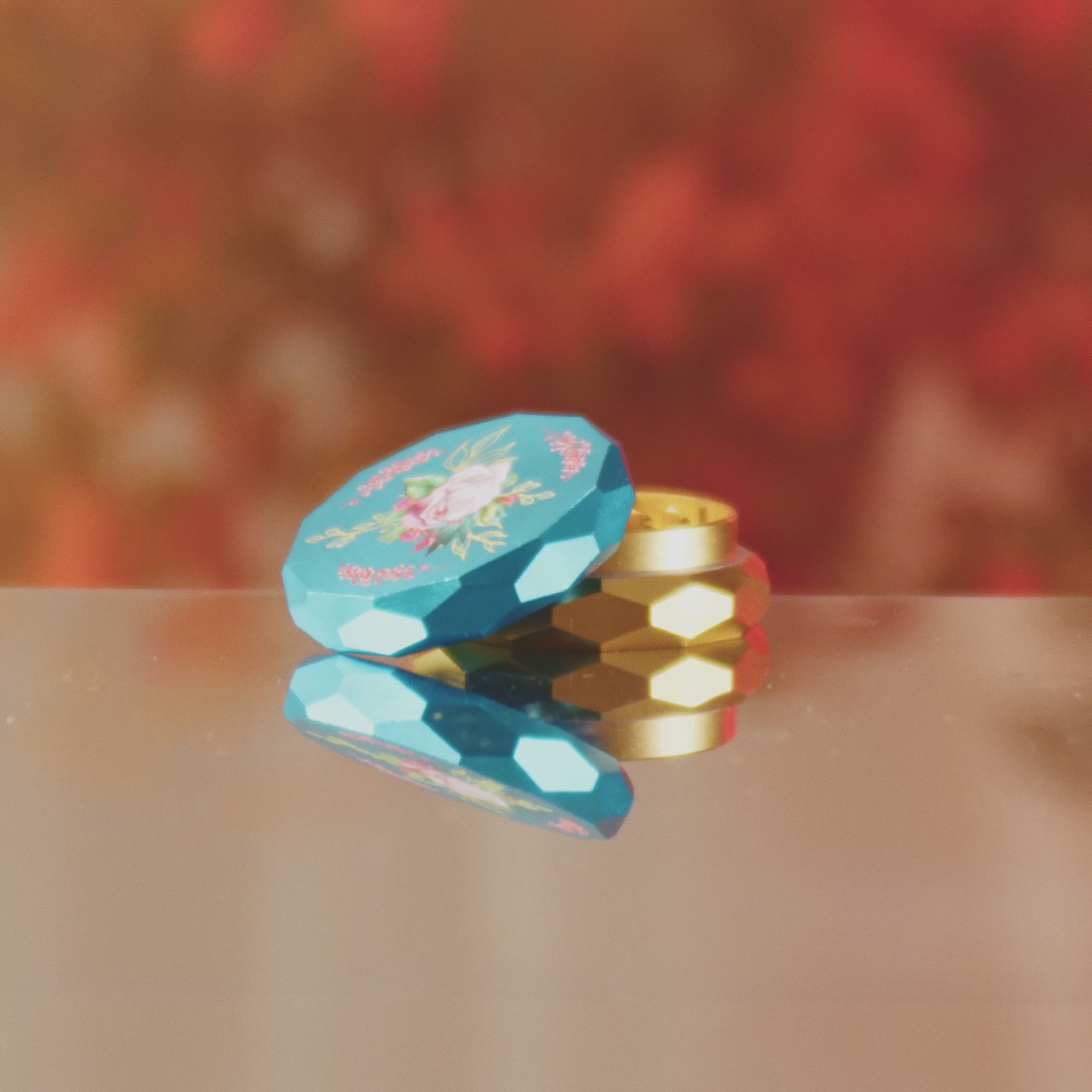 Load video: Famous Design Floral Lush Aluminum 2-Stage Grinder | Teal and Gold